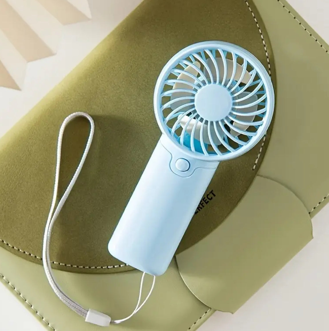 Portable hand held fan