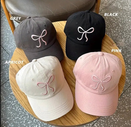 Embroidered bow cap