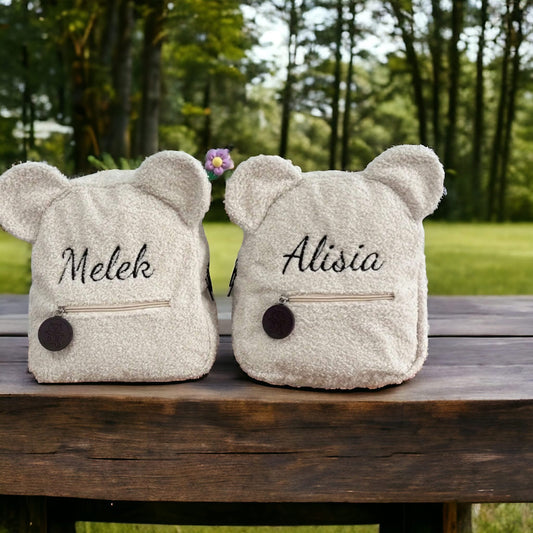 Embroidered teddy fleeced backpack