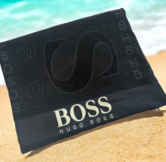Extra large thick embroidered boss beach towels.