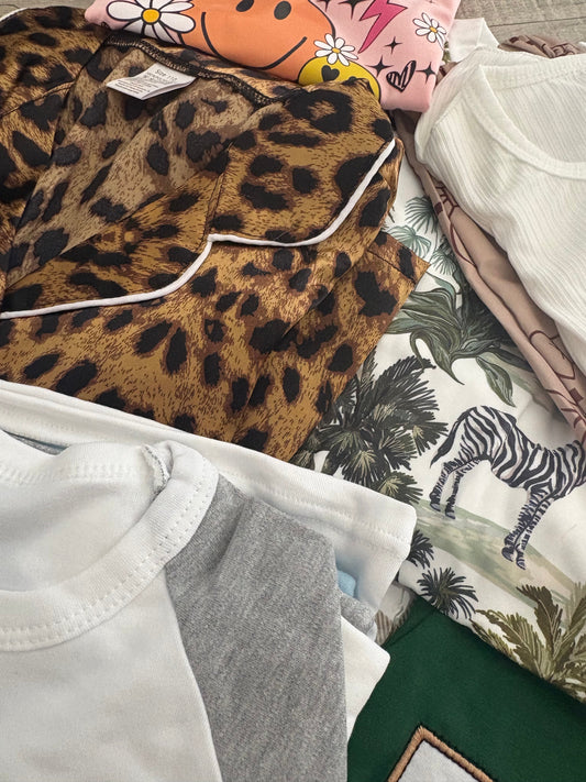 £1 TRY OUR CLOTHING MYSTERY BAG